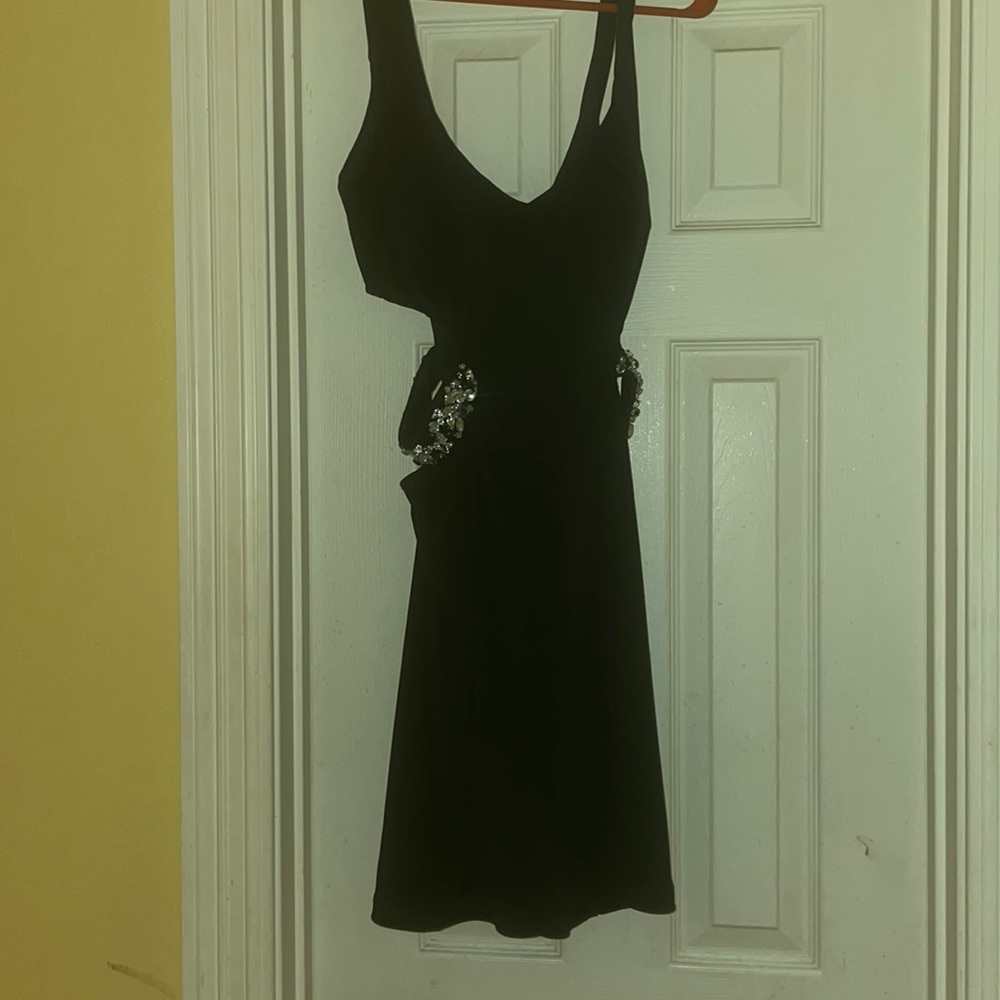 Black dress. Cut out sides